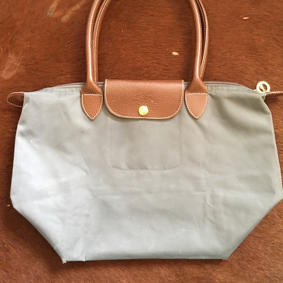 Longchamp Handbags - Grey used Longchamp small bag.